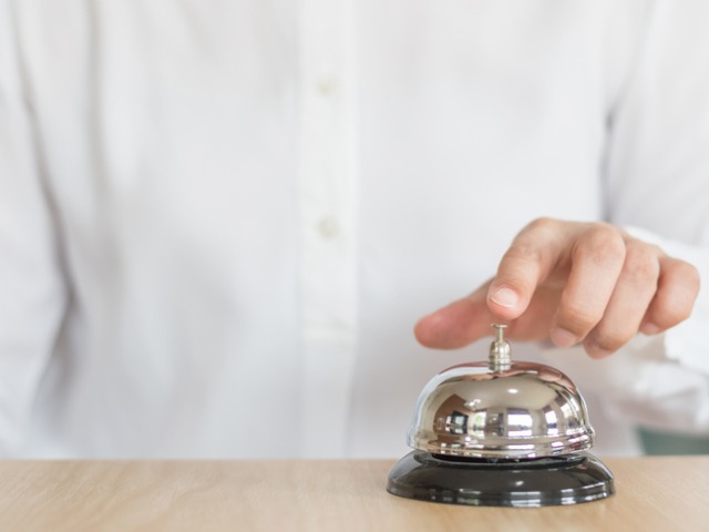 hotel-restaurant-bell-service-on-concierge-customer-reception-counter-picture-id964642444